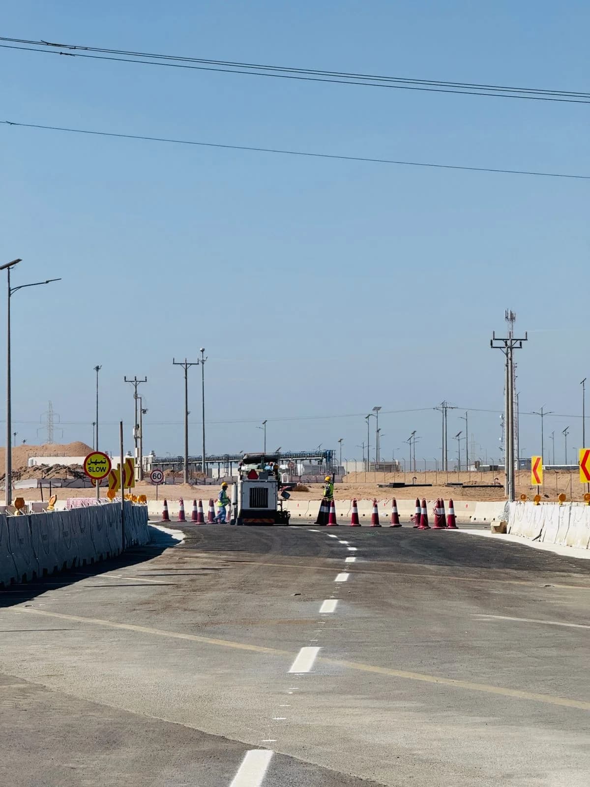 Alternate view of a NEOM road lane work zone with temporary traffic control.
